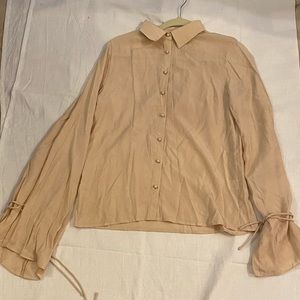 Blouse with covered buttons, silky material, long sleeve